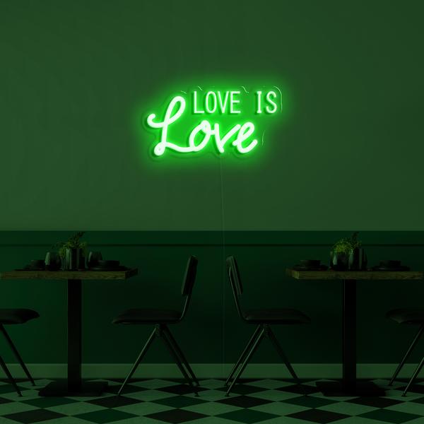 Logo 3D neon LED në mur - Love is Love me përmasa 50 cm