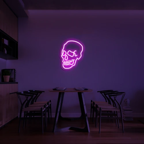 Logo 3D me ngjyra të ndezura neoni në një mur të kafkës